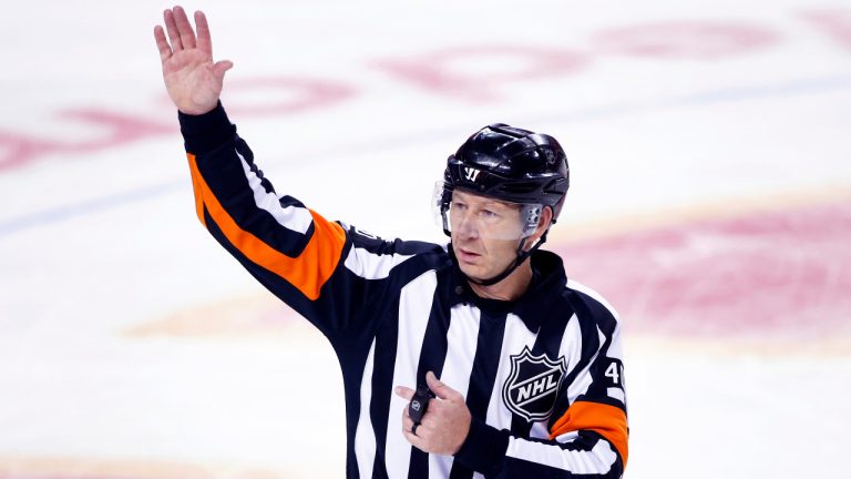 NHL referee Steve Kozari during a game between the Calgary Flames and Edmonton Oilers in Calgary, Alta. on May 20, 2022. (Larry MacDougal/CP)