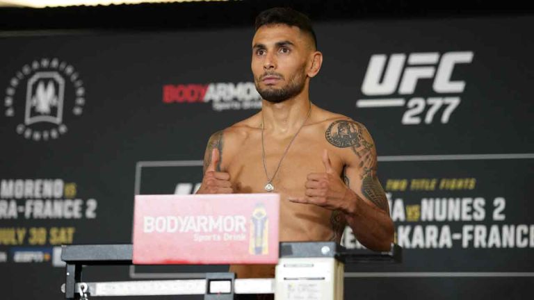 Alex Perez steps on the scale for the official fight weigh-in at Hyatt Regency Dallas for UFC 277: Peña v Nunes 2 on July 29, 2022 in Dallas, Texas, United States. Photo by Louis Grasse/PxImages/ABACAPRESS.COM