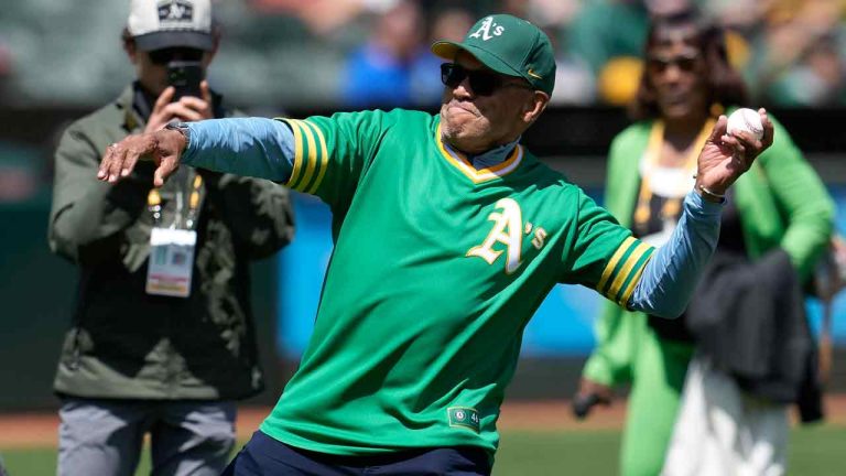 Former Oakland Athletics player Reggie Jackson throws out the ceremonial first pitch after a ceremony honoring the Athletics' 1973 World Series championship team before a baseball game between the Athletics and the New York Mets in Oakland, Calif., Sunday, April 16, 2023. (Jeff Chiu/AP)