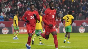 Canada's Alphonso Davies (19) celebrates scoring his team's opening goal against Jamaica with Jonathan David (20) during first half CONCACAF Nations League quarter-final action in Toronto, on Tuesday, November 21, 2023. (Chris Young/CP)