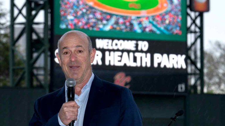 John Fisher, owner of the Oakland Athletics baseball team, announces that his team will leave Oakland after this season and play temporarily at a minor league park, during a news conference in West Sacramento, Calif., Thursday, April 4, 2024. The A's announced the decision to play at the home of the Sacramento River Cats from 2025-27 with an option for 2028 on Thursday after being unable to reach an agreement to extend their lease in Oakland during that time. (Rich Pedroncelli/AP)