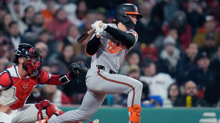 Baltimore Orioles Jackson Holliday swings during a baseball game, Wednesday, April 10, 2024, in Boston. (AP Photo/Charles Krupa) 