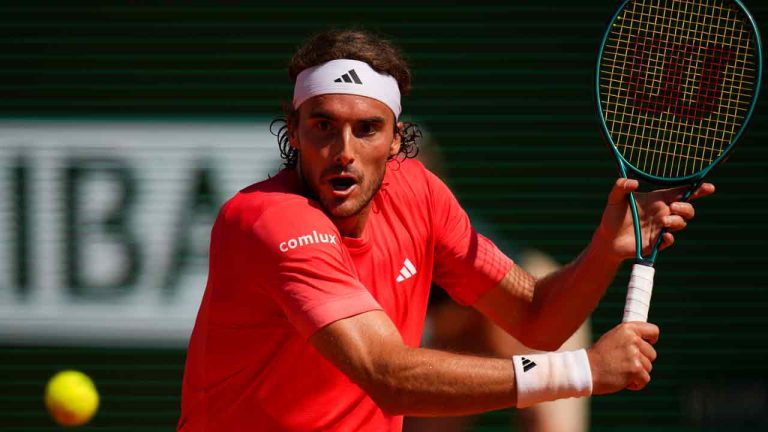 Stefanos Tsitsipas in action against Zhang Zhizhen at the French Open. (Daniel Cole/AP)