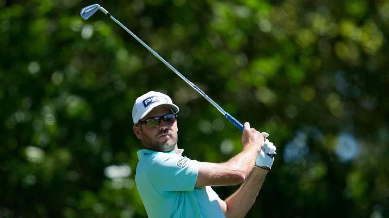 Corey Conners, of Canada, watches his tee shot on the fourth hole during third round at the Masters golf tournament at Augusta National Golf Club Saturday, April 13, 2024, in Augusta, Ga. (Ashley Landis/AP)