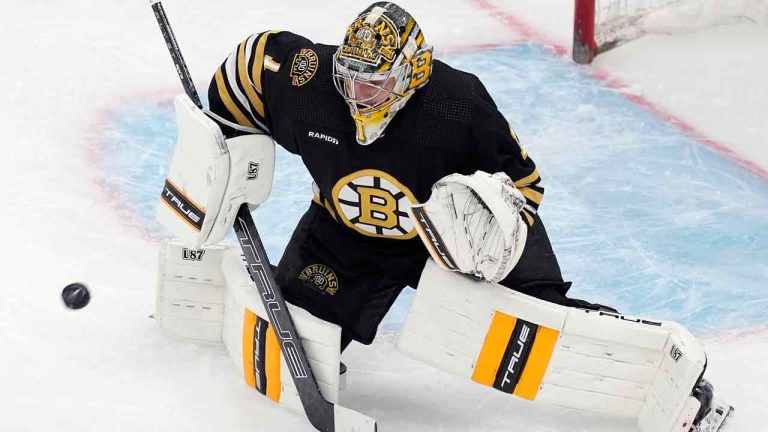 Boston Bruins' Jeremy Swayman blocks a Toronto Maple Leafs shot during the second period in Game 1 of an NHL hockey Stanley Cup first-round playoff series Saturday, April 20, 2024, in Boston. (Michael Dwyer/AP)