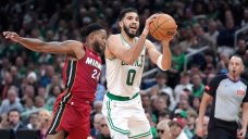 Jayson Tatum&#8217;s triple-double leads Celtics past Butler-less Heat in playoff opener