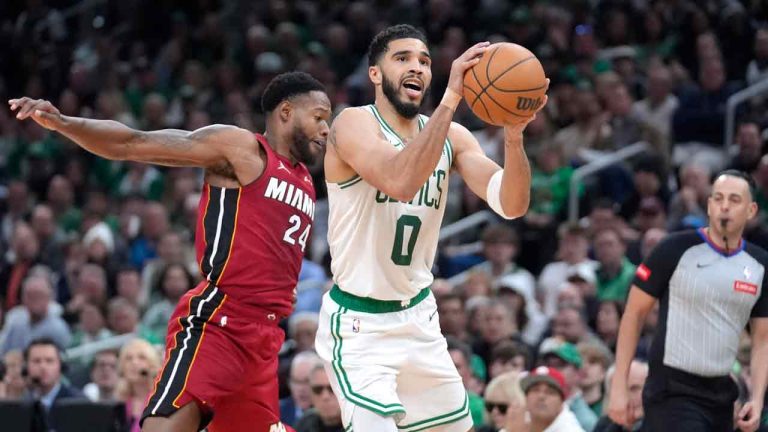 Boston Celtics forward Jayson Tatum (0) drives toward the basket as Miami Heat forward Haywood Highsmith (24) defends in the first half of Game 1 of an NBA basketball first-round playoff series, Sunday, April 21, 2024, in Boston. (Steven Senne/AP)