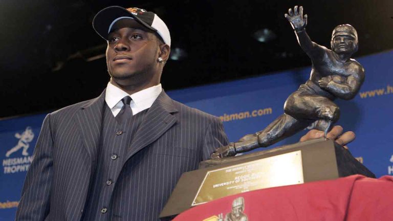 Heisman Trophy winner Reggie Bush of the University of Southern California poses for photographs Saturday Dec. 10, 2005 in New York. (Frank Franklin II/AP)