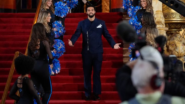 Southern California quarterback Caleb Williams poses on the red carpet ahead of the first round of the NFL football draft, Thursday, April 25, 2024, in Detroit. (AP/Carlos Osorio)