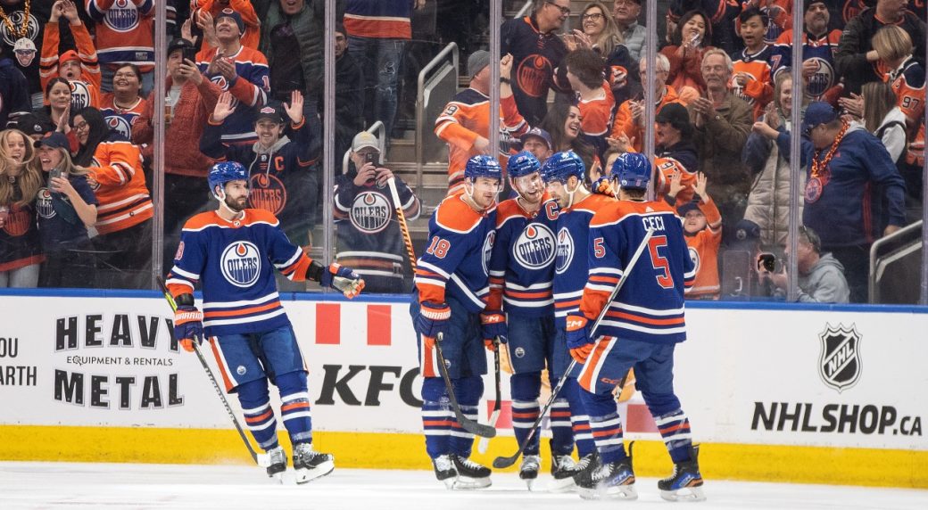 Oilers clinch playoff berth with win over Avalanche