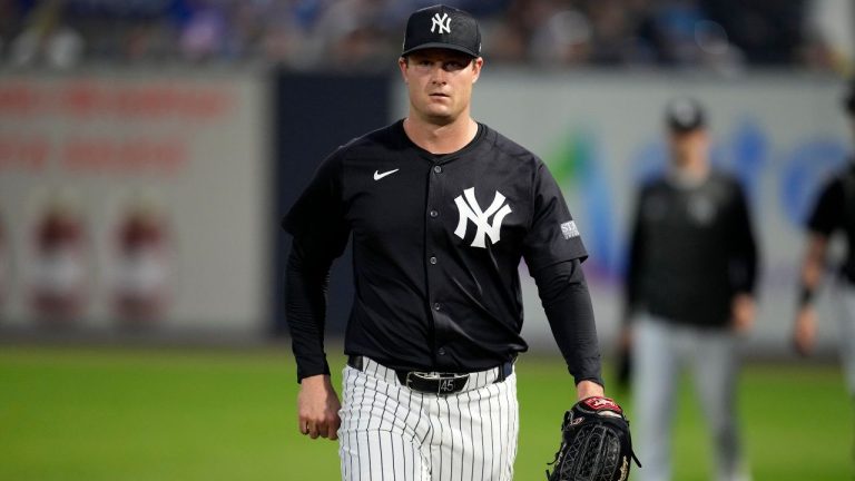 New York Yankees starting pitcher Gerrit Cole walks to the field before a spring training baseball game against the Toronto Blue Jays Friday, March 1, 2024, in Tampa, Fla. (Charlie Neibergall/AP Photo)