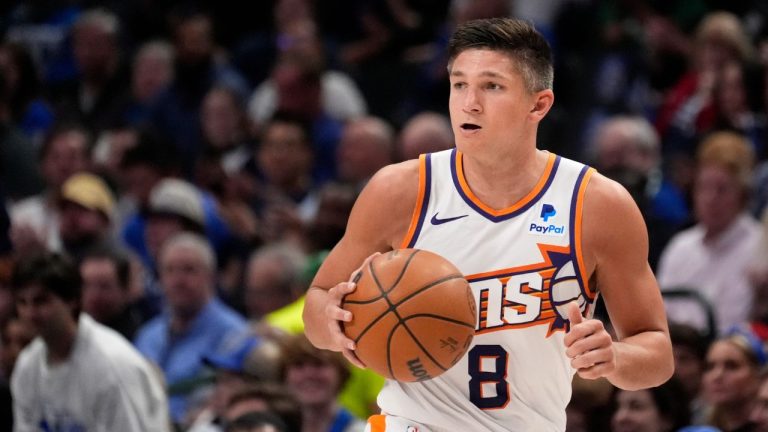 Phoenix Suns guard Grayson Allen works against the Dallas Mavericks during an NBA basketball game in Dallas, Thursday, Feb. 22, 2024. (Tony Gutierrez/AP Photo)