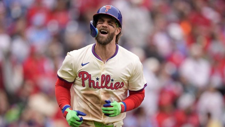 Philadelphia Phillies' Bryce Harper reacts after hitting an RBI-sacrifice flay against Chicago White Sox pitcher Tanner Banks during the fourth inning of a baseball game, Sunday, April 21, 2024, in Philadelphia. (Matt Slocum/AP Photo)
