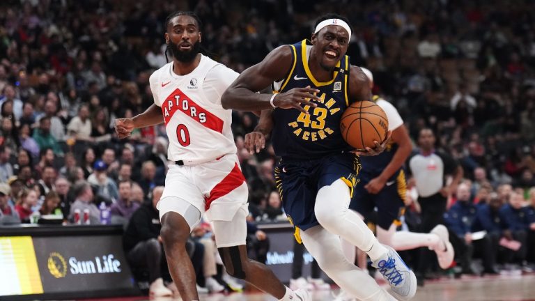 Indiana Pacers forward Pascal Siakam (43) drives past Toronto Raptors guard Javon Freeman-Liberty (0) during first half NBA basketball action in Toronto on Tuesday, April 9, 2024. (Nathan Denette/CP)