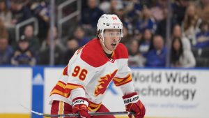 Calgary Flames' Andrei Kuzmenko in action during the first period of an NHL hockey game against the St. Louis Blues Thursday, March 28, 2024, in St. Louis. (Jeff Roberson/AP)