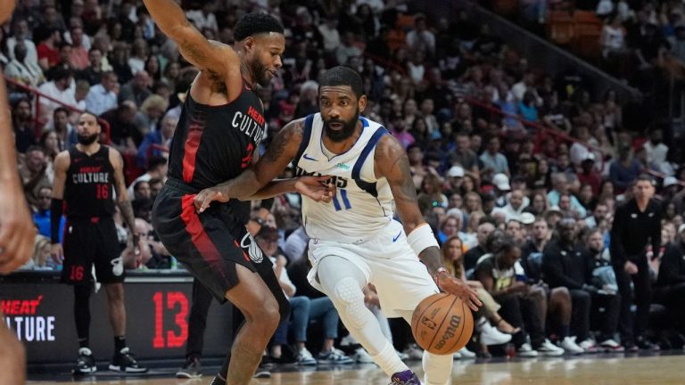 Miami Heat forward Haywood Highsmith defends Dallas Mavericks guard Kyrie Irving during the first half of an NBA basketball game, Wednesday, April 10, 2024, in Miami. (Marta Lavandier/AP Photo)