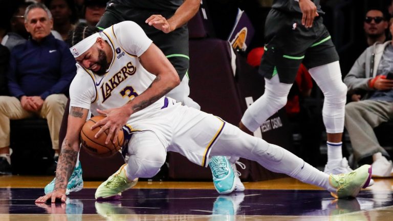 Los Angeles Lakers forward-center Anthony Davis (3) slips during the first half of an NBA basketball game against the Minnesota Timberwolves Sunday, April 7, 2024, in Los Angeles. (Etienne Laurent/AP)