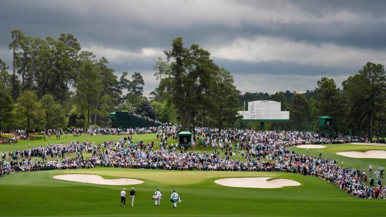 Chris Kirk and Ryan Fox, of New Zealand, walk on the second hole during the first round at the Masters golf tournament. (Ashley Landis/AP)