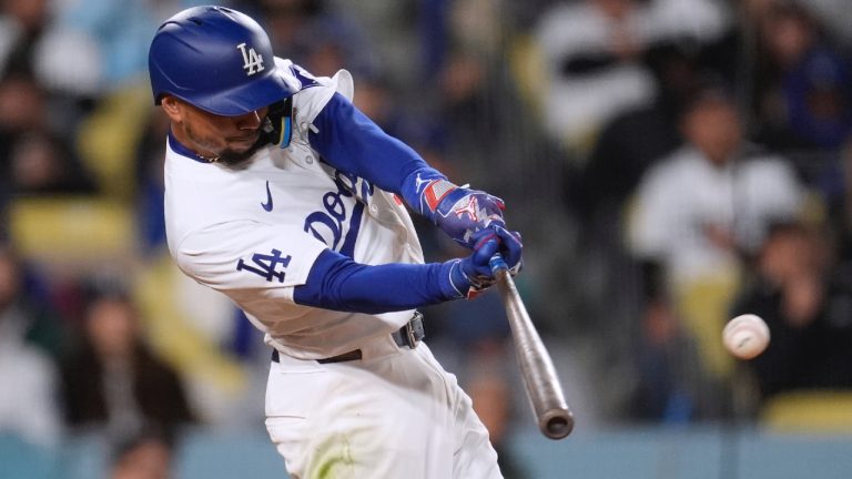 Los Angeles Dodgers' Mookie Betts connects for a single against the San Diego Padres during the third inning of a baseball game Saturday, April 13, 2024, in Los Angeles. (Marcio Jose Sanchez/AP)