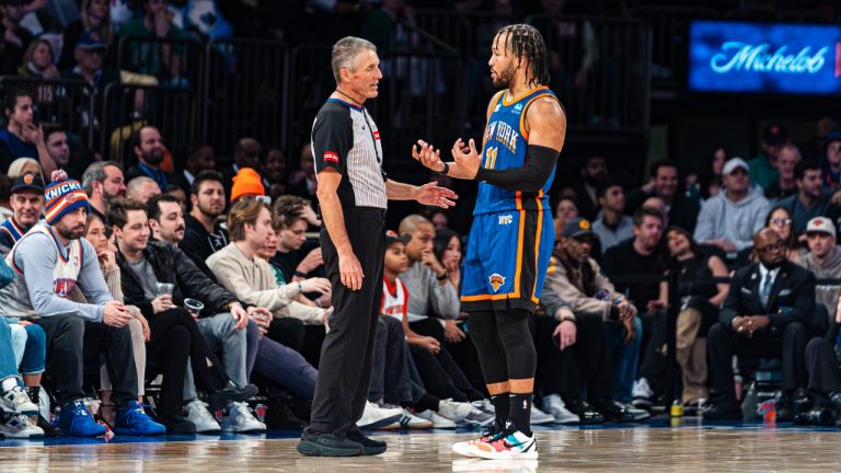 New York Knicks guard Jalen Brunson (11) speaks with referee Scott Foster during the second half of an NBA basketball game against the Boston Celtics in New York, Saturday, Feb. 24, 2024. (AP Photo/Peter K. Afriyie)