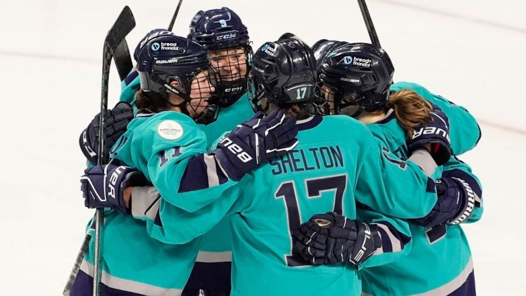 New York's Jessie Eldridge celebrates with teammates after scoring a goal against Montreal during the third period of a PWHL hockey game Wednesday, March 6, 2024, in Bridgeport, Conn. (Frank Franklin II/AP)