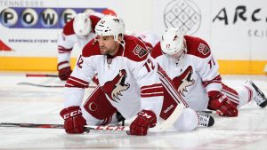 Paul Bissonnette of the Phoenix Coyotes stretches in warm ups prior to a game against the Nashville Predators. (John Russell/NHLI via Getty Images)