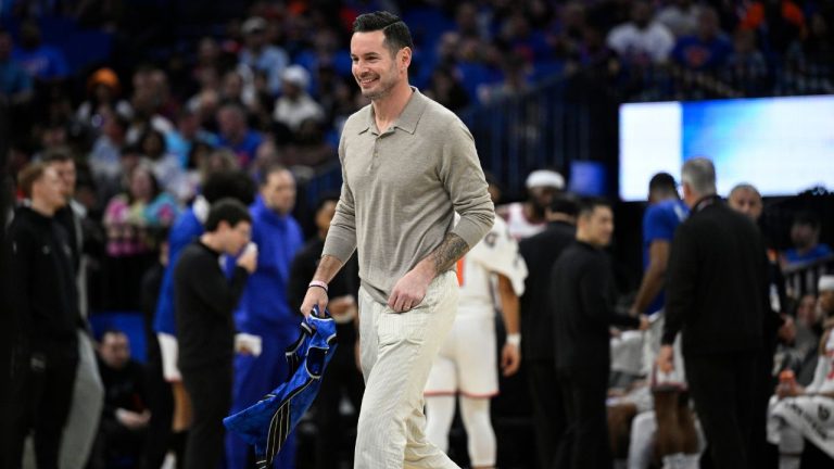 Former Orlando Magic guard JJ Redick leaves the court after being honoured by the team during the first half of an NBA basketball game against the New York Knicks, Wednesday, Feb. 14, 2024, in Orlando, Fla. (Phelan M. Ebenhack/AP Photo)