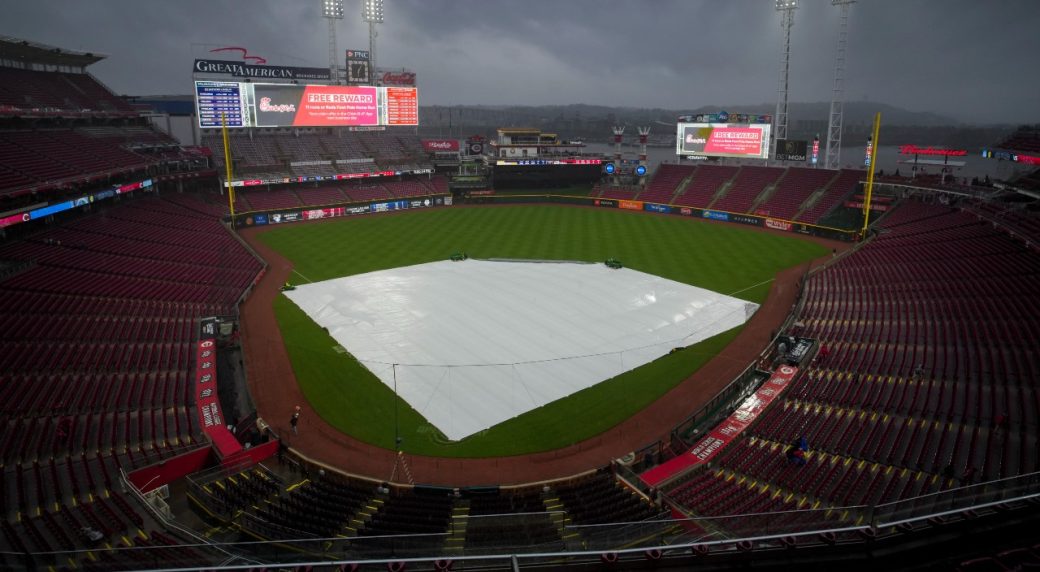 Reds-Brewers game washed out by heavy rain, rescheduled for Aug. 30