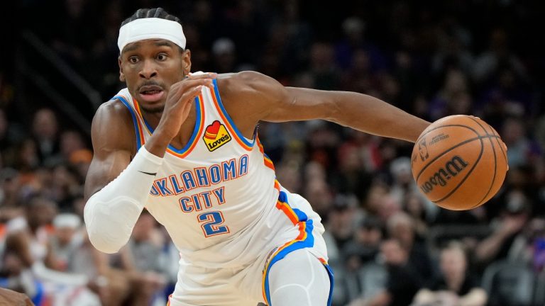 Oklahoma City Thunder guard Shai Gilgeous-Alexander (2) during the first half of an NBA basketball game against the Phoenix Suns, Sunday, March 3, 2024, in Phoenix. (AP Photo/Rick Scuteri)