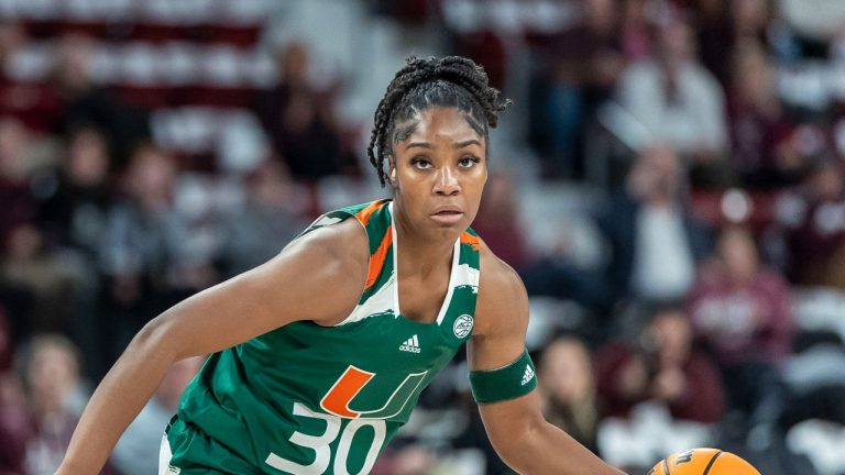 Miami guard Shayeann Day-Wilson (30) during an NCAA basketball game on Wednesday, Nov. 29, 2023, Starkville, Miss. (AP Photo/Vasha Hunt)