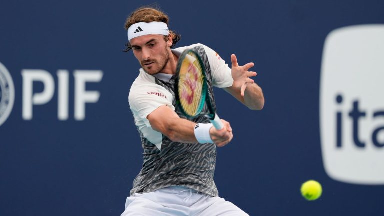 Stefanos Tsitsipas, of Greece, hits a return to Denis Shapovalov, of Canada, during the Miami Open tennis tournament, Saturday, March 23, 2024, in Miami Gardens, Fla. (Lynne Sladky/AP Photo)