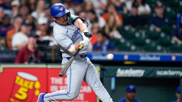 Toronto Blue Jays' Davis Schneider hits a two-run home run against the Houston Astros during the ninth inning of a baseball game Tuesday, April 2, 2024, in Houston. (Eric Christian Smith/AP)