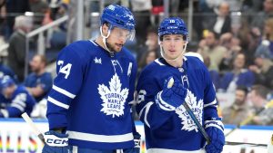 Toronto Maple Leafs' Auston Matthews, left, talks with Mitch Marner during NHL hockey action against the Vegas Golden Knights in Toronto, on Tuesday, February 27, 2024. (Chris Young/CP)