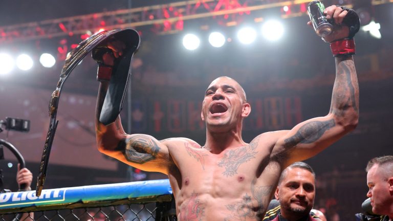 UFC light heavyweight champion Alex Pereira leaves the octagon after defeating Jamahal Hill in a title defense during the UFC 300 mixed martial arts event Saturday, April 13, 2024, in Las Vegas. (Steve Marcus/Las Vegas Sun via AP)