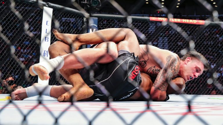 Brendan Allen, top, looks for a submission hold on Karl Roberson during a UFC 261 mixed martial arts bout. (Gary McCullough/AP)