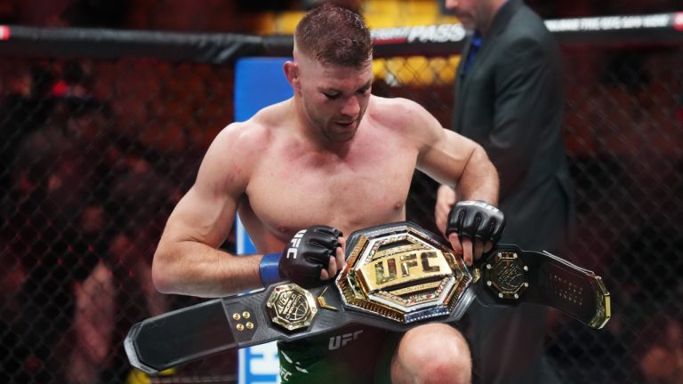 Dricus Du Plessis celebrates after defeating Sean Strickland in a middleweight title bout at UFC 297 in Toronto. (Nathan Denette/CP)