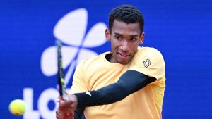 Canada's Felix Auger-Aliassime plays Germany's Jan-Lennard Struff during their quarter final match at the Tennis ATP tournament in Munich, Germany, Friday, April 19, 2024. (Sven Hoppe/dpa via AP)