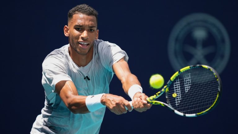 Felix Auger-Aliassime, of Canada, plays a ball from Adam Walton, of Australia, in their men's first round match at the Miami Open tennis tournament, Thursday, March 21, 2024, in Miami Gardens, Fla. (Rebecca Blackwell/AP)