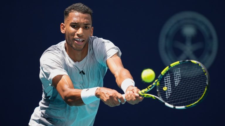 Felix Auger-Aliassime, of Canada, plays a ball from Adam Walton, of Australia, in their men's first round match at the Miami Open tennis tournament, Thursday, March 21, 2024, in Miami Gardens, Fla. (Rebecca Blackwell/AP)