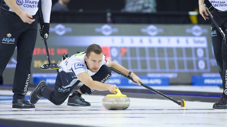 Brendan Bottcher shoots a stone during the Princess Auto Players' Championship on Tuesday, April 9, 2024, in Toronto. (Anil Mungal/GSOC)