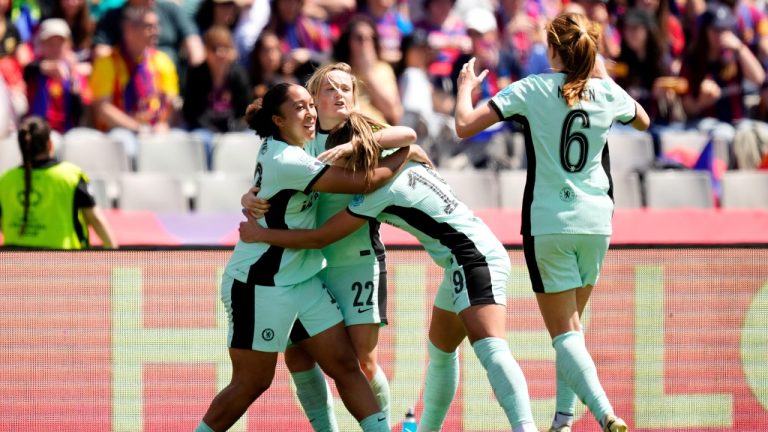 Chelsea's Erin Cuthbert, 2nd left, celebrates with her teammates after scoring the opening goal during the women's Champions League semifinals, first leg, soccer match between FC Barcelona and Chelsea FC at the Olympic Stadium, in Barcelona, Spain, Saturday, April 20, 2024. (Jose Breton/AP)