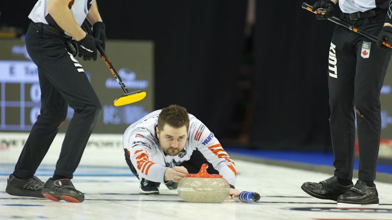 Matt Dunstone shoots a rock during the Princess Auto Players' Championship on Wednesday, April 10, 2024, in Toronto. (Anil Mungal/GSOC)