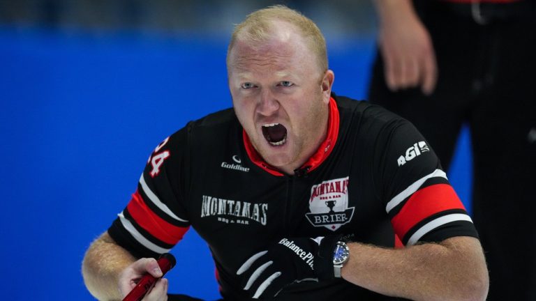 Ontario skip Scott Howard calls out to the sweepers while playing Newfoundland and Labrador during the Brier, in Regina, on Monday, March 4, 2024. (Darryl Dyck/CP)