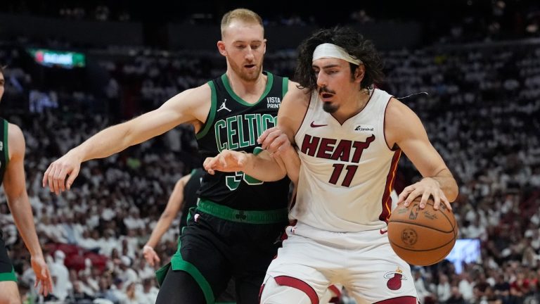 Boston Celtics forward Sam Hauser (30) defends Miami Heat guard Jaime Jaquez Jr. (11) during the second half of Game 4 of an NBA basketball first-round playoff series, Monday, April 29, 2024, in Miami. (Marta Lavandier/AP)