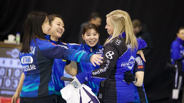 Satsuki Fujisawa, Chinami Yoshida, Yurika Yoshida and Yumi Suzuki share a hug with Jennifer Jones following their game at the Princess Auto Players' Championship on Wednesday, April 10, 2024, in Toronto. (Anil Mungal/GSOC)