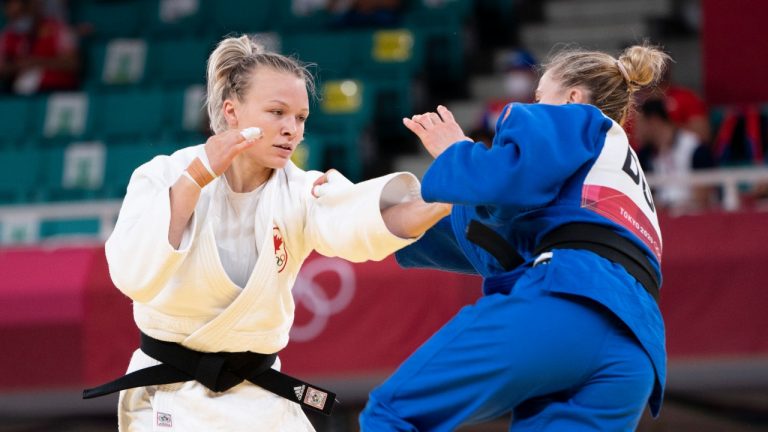 Jessica Klimkait, from Whitby, Ont. competes against Bulgaria’s Ivelina Ilieva during second round competition in 57kg Women’s Judo competition at the Tokyo Olympics, Monday, July 26, 2021 in Tokyo, Japan. (Adrian Wyld/THE CANADIAN PRESS)