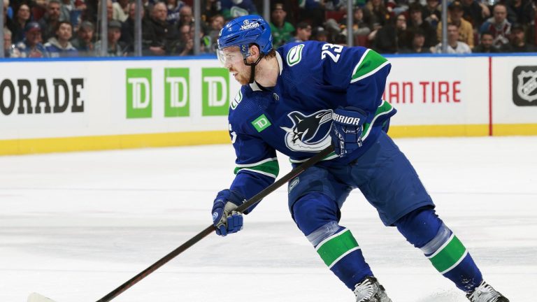 Elias Lindholm of the Vancouver Canucks skates up ice during their NHL game against the Colorado Avalanche at Rogers Arena on March 13, 2024 in Vancouver, British Columbia, Canada. (Jeff Vinnick/NHLI via Getty Images)