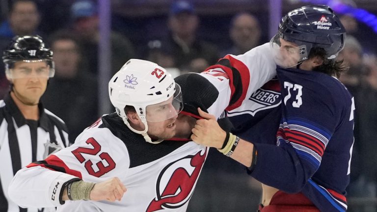 New Jersey Devils defenceman Kurtis MacDermid (23) fights New York Rangers center Matt Rempe (73) during the first period of an NHL hockey game, Wednesday, April 3, 2024, at Madison Square Garden in New York. (Mary Altaffer/AP)