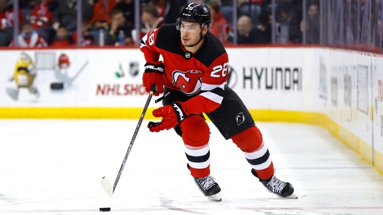 New Jersey Devils right wing Timo Meier (28) skates with the puck against the Columbus Blue Jackets during the second period of an NHL hockey game, Wednesday, Dec. 27, 2023, in Newark, N.J. (Noah K. Murray/AP)