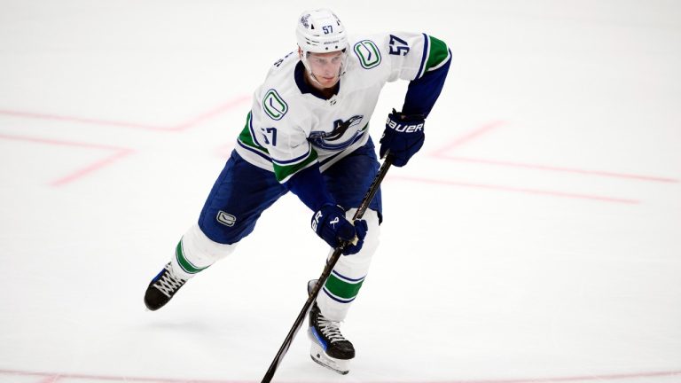 Vancouver Canucks defenseman Tyler Myers skates with the puck during the third period of an NHL hockey game against the Washington Capitals, Sunday, Feb. 11, 2024, in Washington. (Nick Wass/AP)